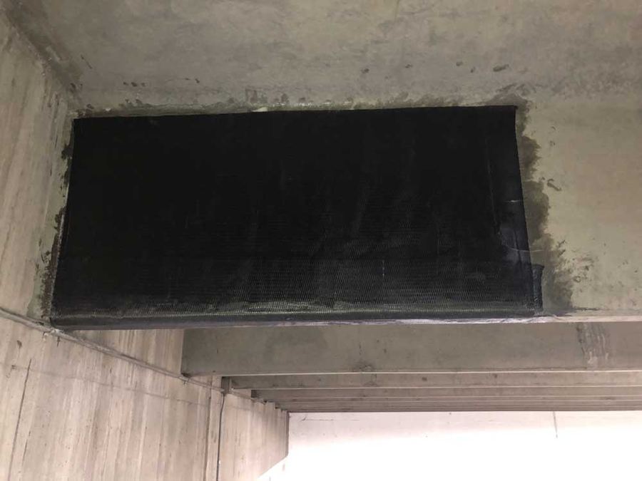 Carbon fiber wrap on the underside of a parking garage beam