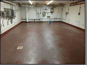 Coated floor in a food processing room
